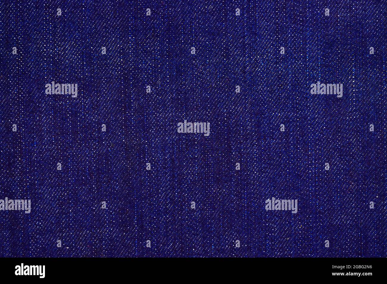 Textur aus blauer Denim-Jeans Stockfoto