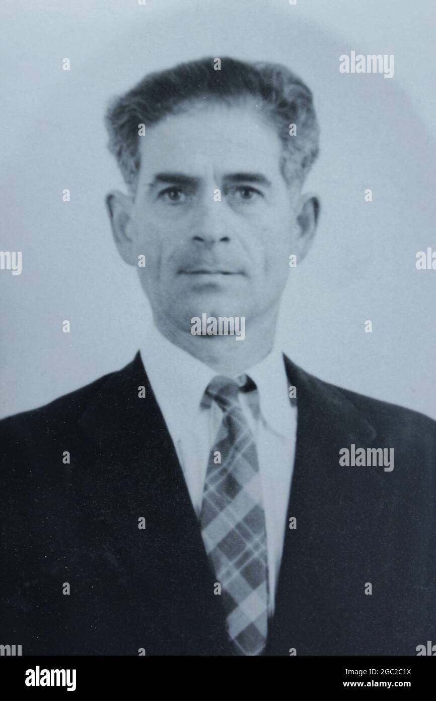 Ein altes Foto eines professionellen Portraits eines hübschen jungen Mannes. Stockfoto