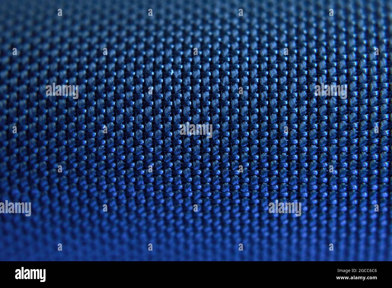 Blaues Mesh-Textur-Makro - Mesh-Nähte - seilartige Textur - Lautsprechertextur Stockfoto Blaues Mesh-Textur-Makro - Mesh-Nähte - seilartige Textur - Lautsprechertextur Stockfoto