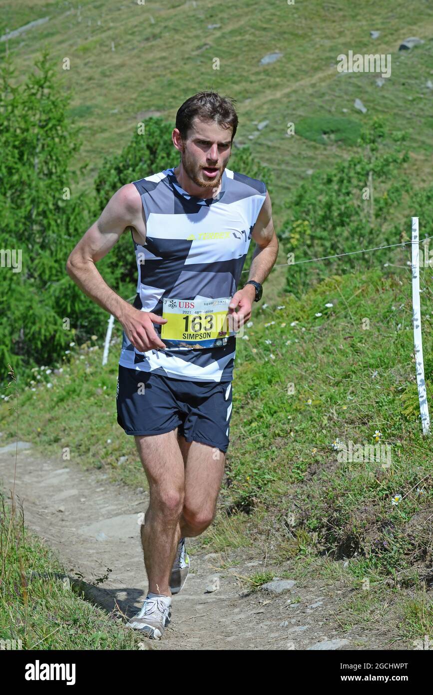 Zinal, SCHWEIZ - 7. AUGUST: Eliteläufer Robbie Simpson (GB) Team Addidas bei der Sierre-Zinal Weltmeisterschaft Trailrennen: 7. August 2021 in Zin Stockfoto