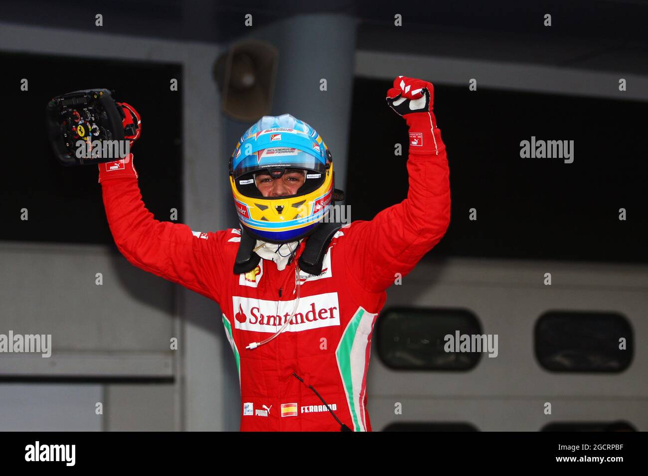 Rennsieger Fernando Alonso (ESP) Ferrari feiert im Parc Ferme. 25.03.2012. Formel-1-Weltmeisterschaft, Rd 2, Großer Preis Von Malaysia, Sepang, Malaysia, Sunday Race - www.xpbimages.com, E-Mail: requests@xpbimages.com - für gedruckte Bilder ist eine Kopie der Veröffentlichung erforderlich. Jedes verwendete Bild ist gebührenpflichtig. â© Copyright: Moy / XPB Images Stockfoto