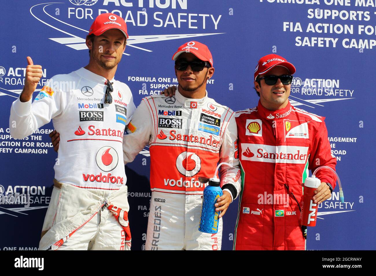 Qualifying Park Ferme TOP 3 (L bis R): Jenson Button (GBR) McLaren, Zweiter; Lewis Hamilton (GBR) McLaren, Pole Position; Sebastian Vettel (GER) Red Bull Racing, Dritter. Großer Preis von Italien, Samstag, 8. September 2012. Monza Italien. Stockfoto