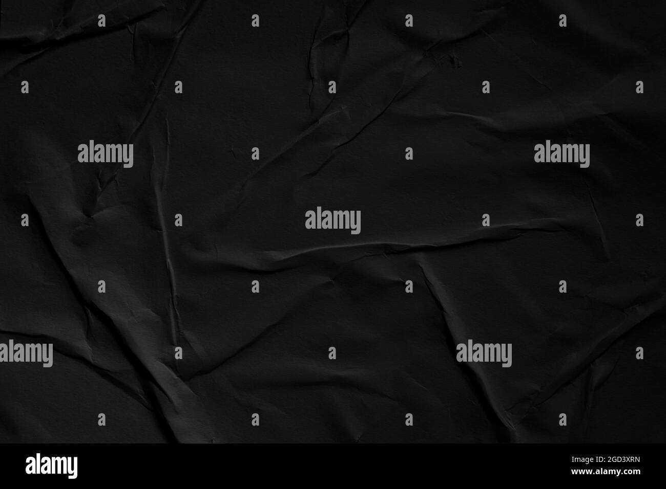 Verwitterter schwarzer Papiertextur-Hintergrund Stockfoto