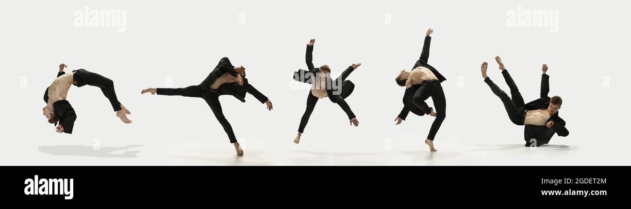 Levitation. Erstaunliche Leistung eines flexiblen männlichen Balletttänzers, der isoliert auf weißem Hintergrund trainiert. Konzept von Kunst, Schönheit, Aspiration Stockfoto