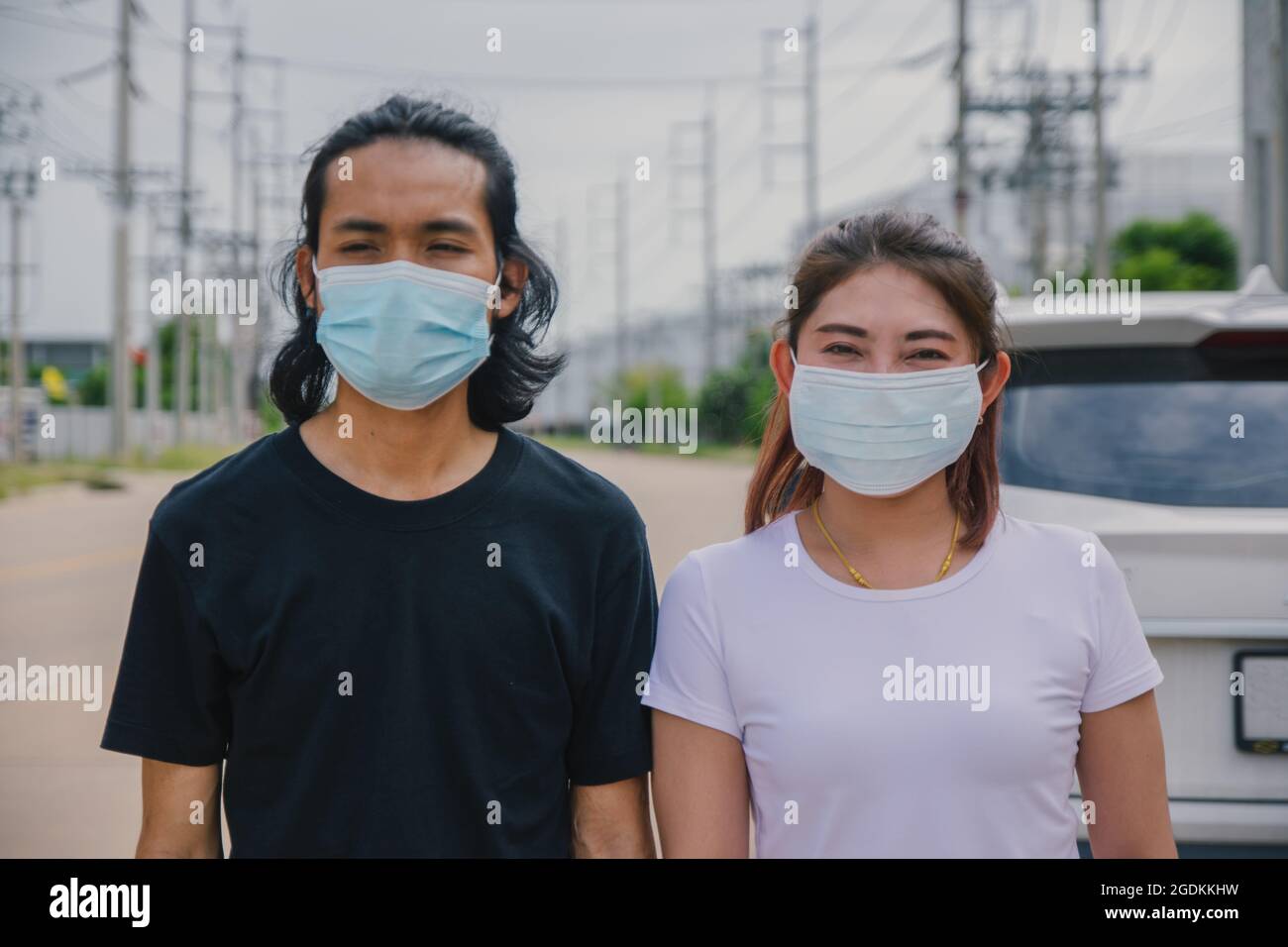 Mann Frauen tragen medizinische Maske schützen Coronavirus covid19 Stockfoto