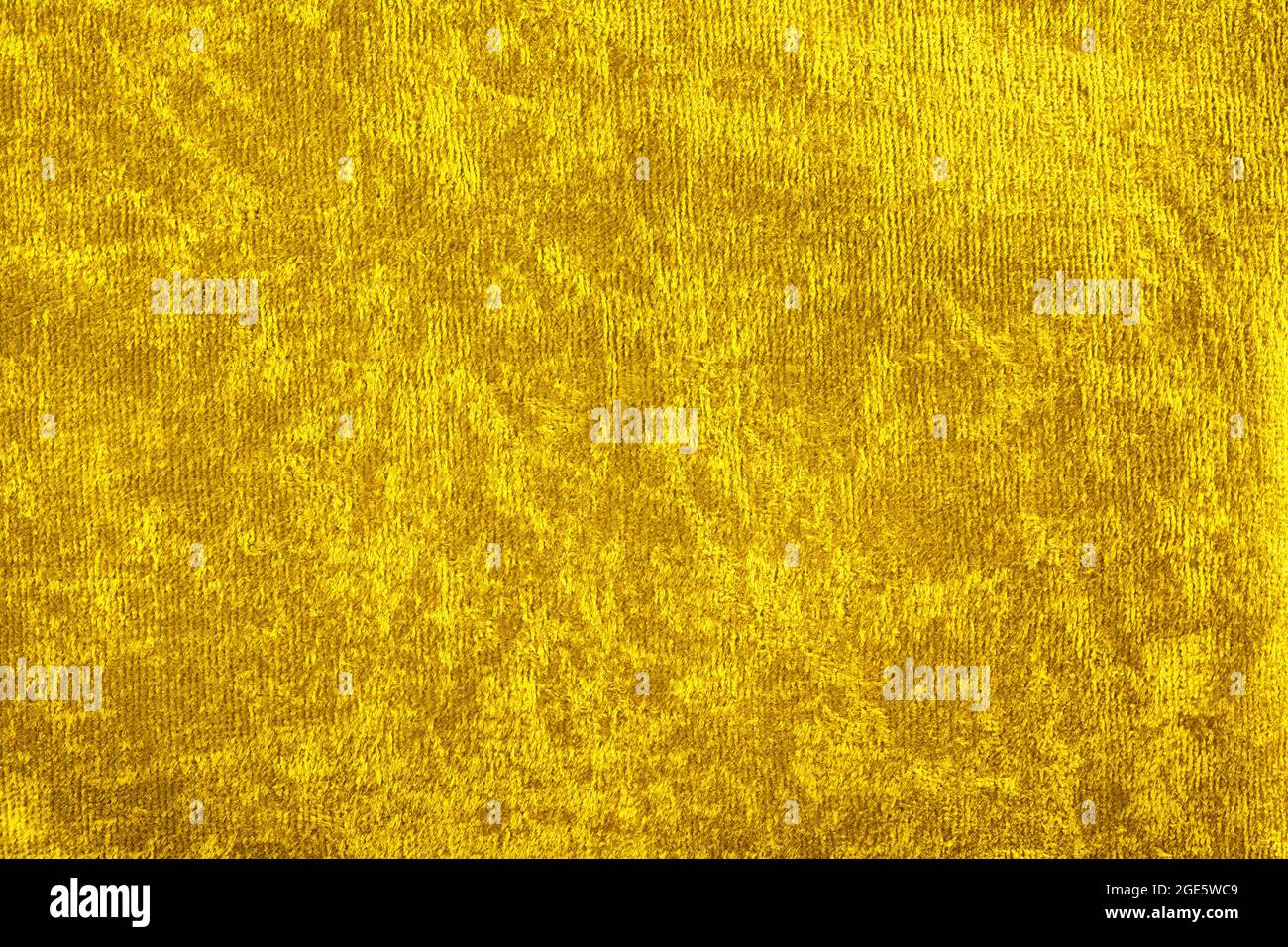 Hintergründe und strukturiert - Gelb Plüsch Textil Hintergrund. Stockfoto