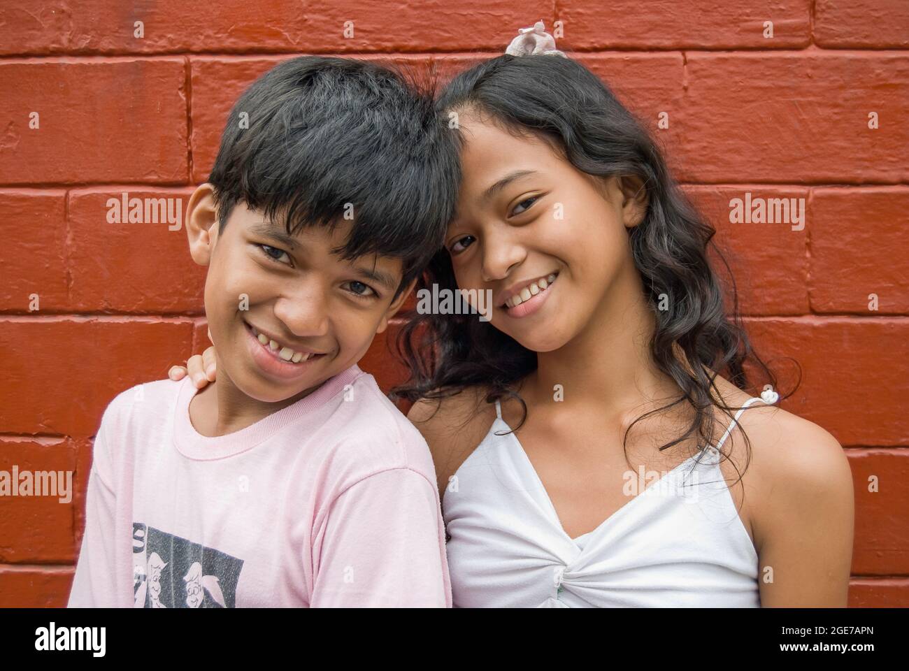 Junge Junge und Mädchen lächelnd, Intramuros, Manila, Philippinen Stockfoto