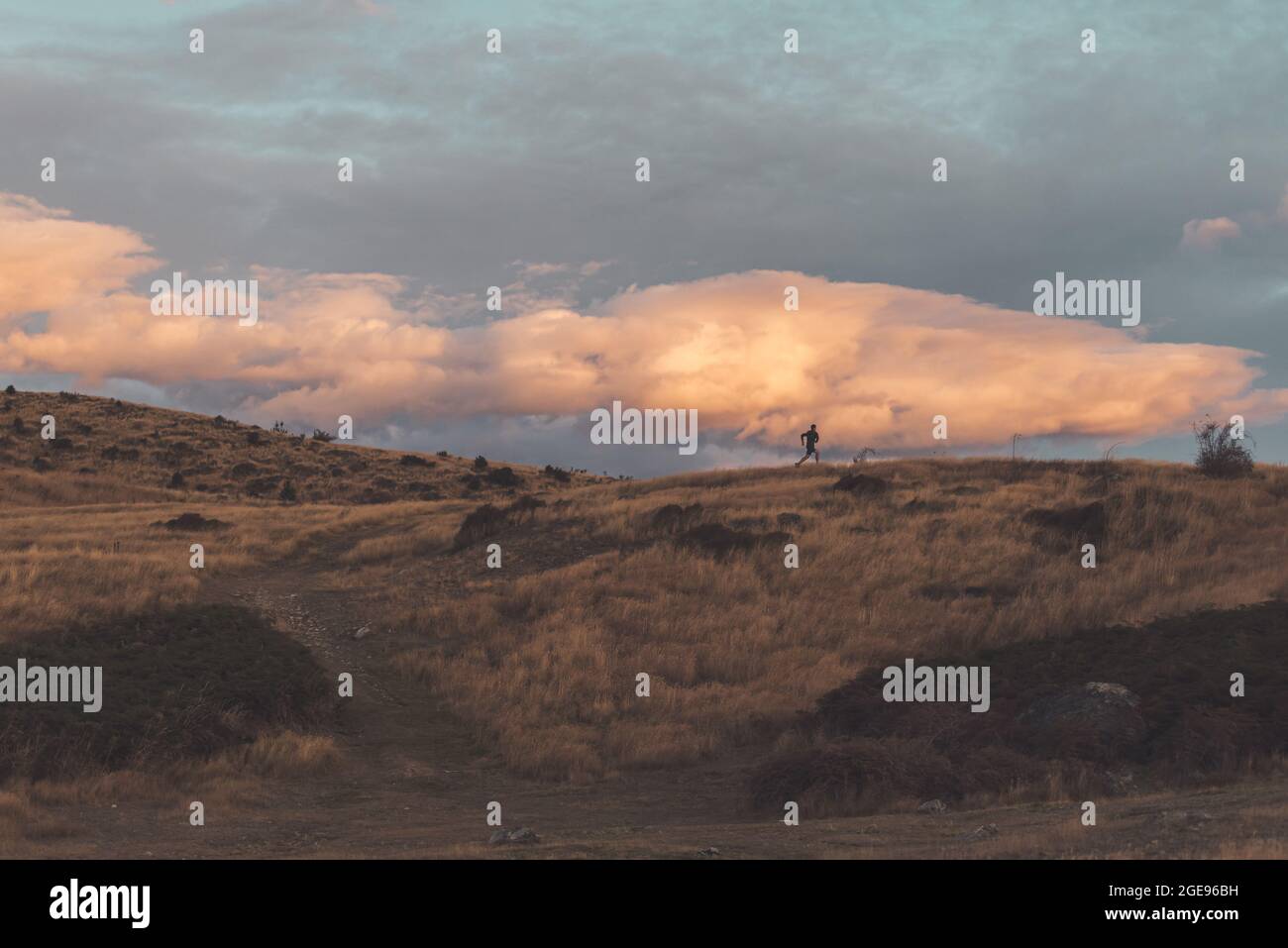 Menschliche Silhouette bei Sonnenuntergang Stockfoto