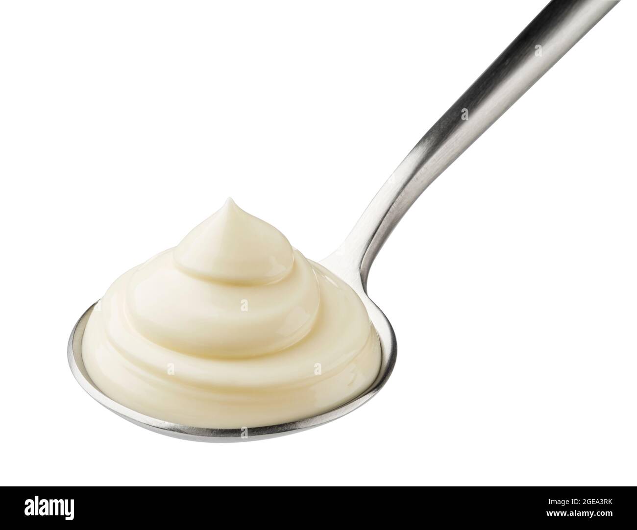 Mayonnaise in Löffel isoliert auf weißem Hintergrund Stockfoto