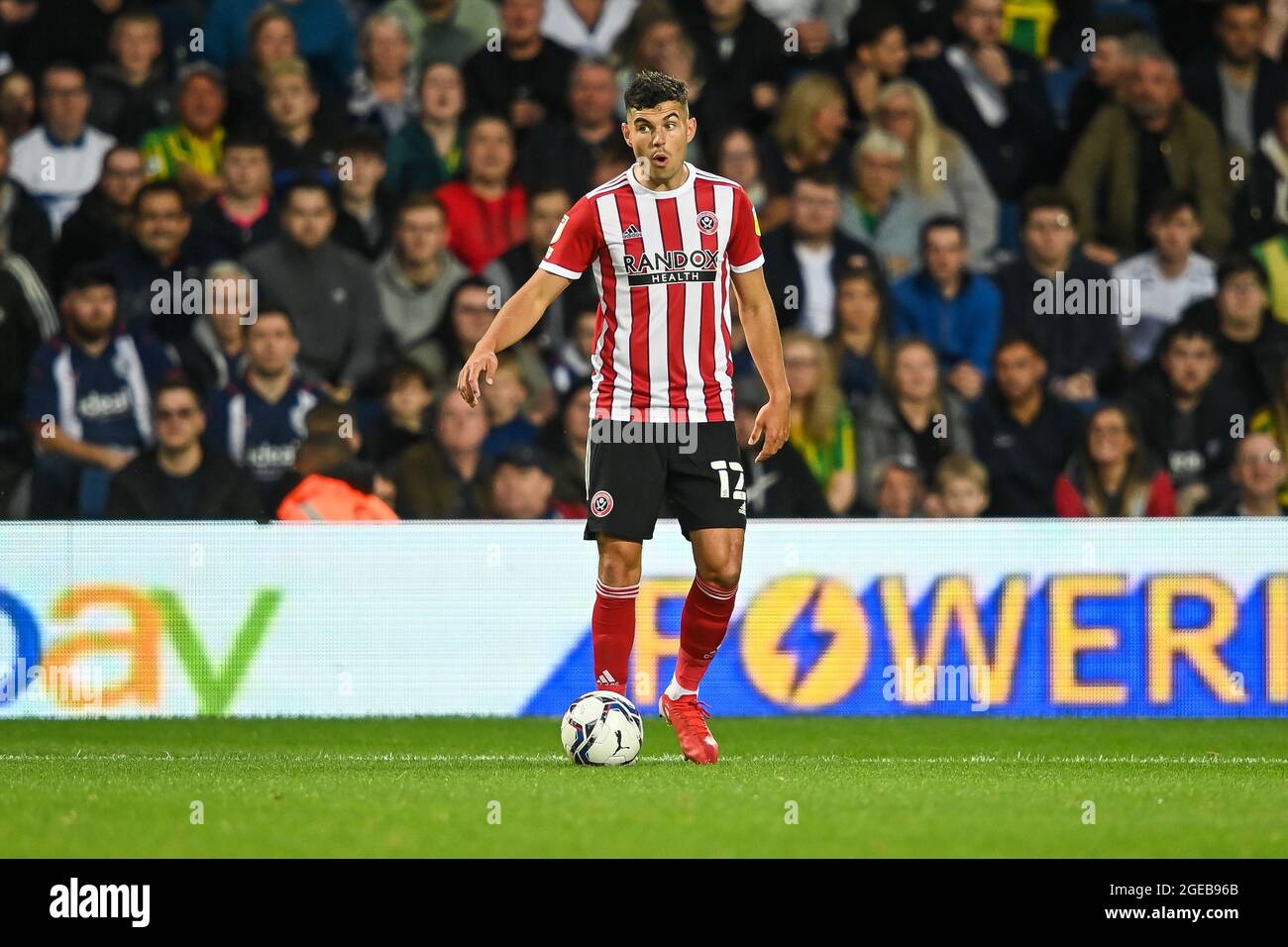 John Egan #12 von Sheffield Vereinigte sich mit dem Ball Stockfoto