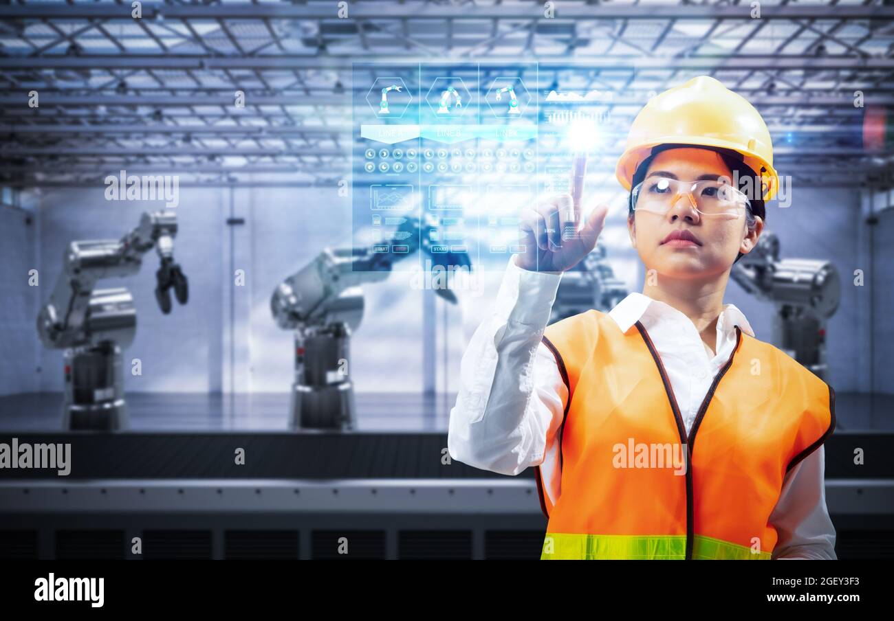 Techniker oder Techniker arbeiten im Werk mit 3d-Rendering-Roboterarmen Stockfoto