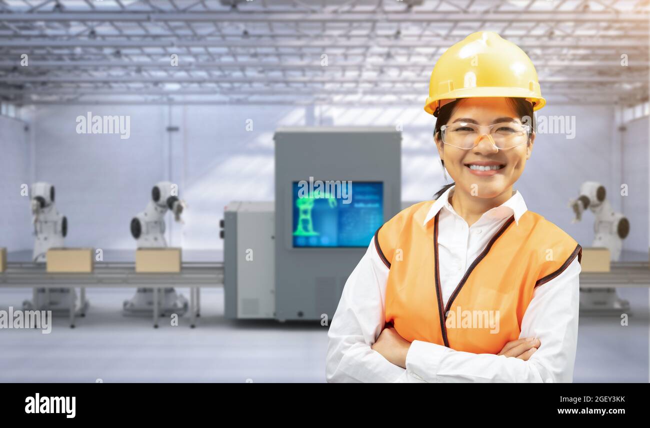 Techniker oder Techniker arbeiten im Werk mit 3d-Rendering-Roboterarmen Stockfoto