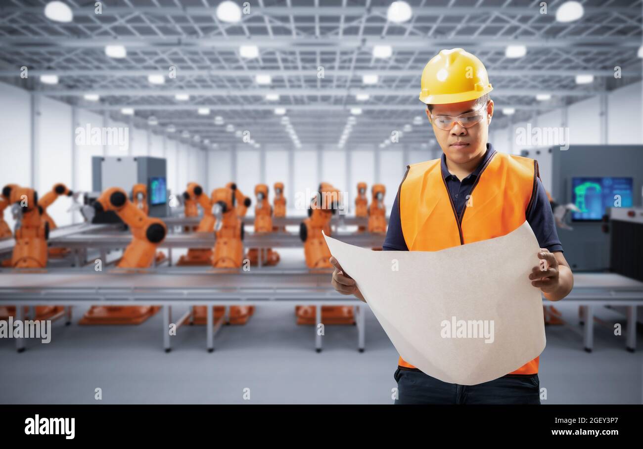 Techniker oder Techniker arbeiten im Werk mit 3d-Rendering-Roboterarmen Stockfoto