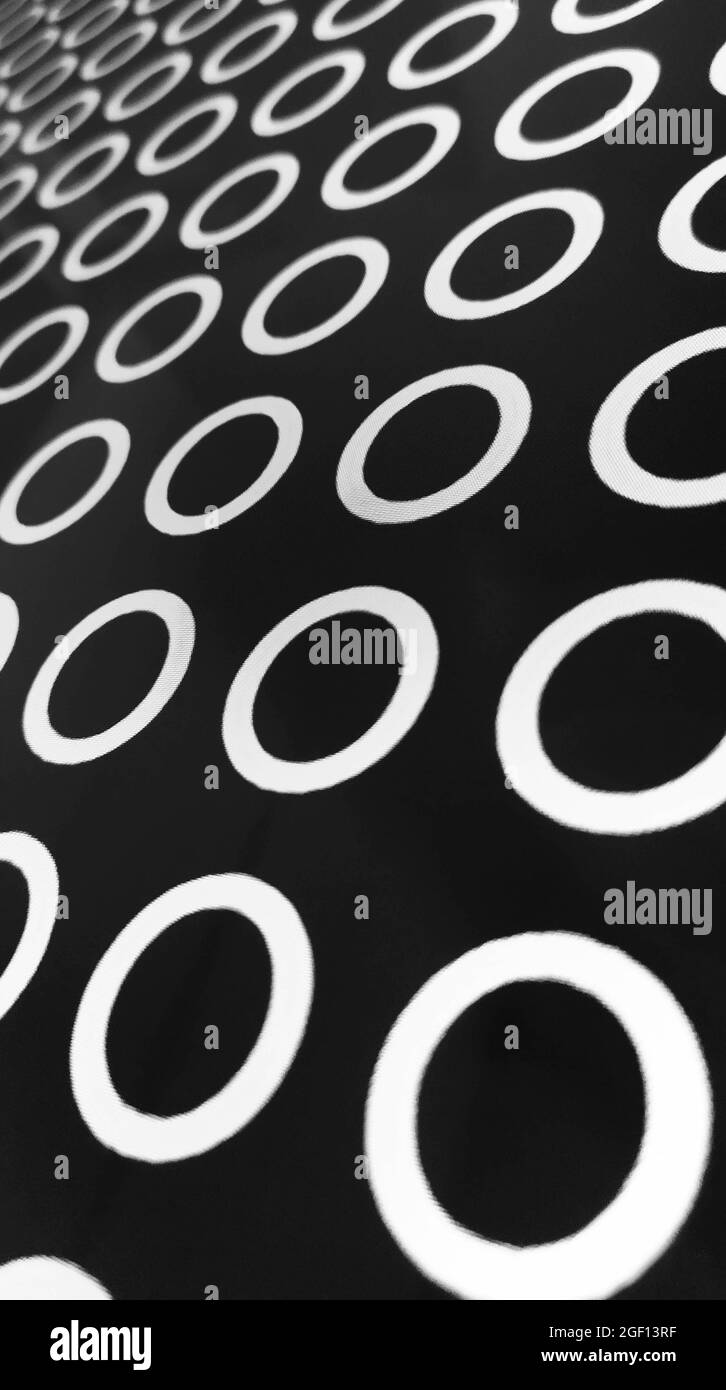 Foto von Grafiken, weiße Kreise auf schwarzem Hintergrund Stockfoto