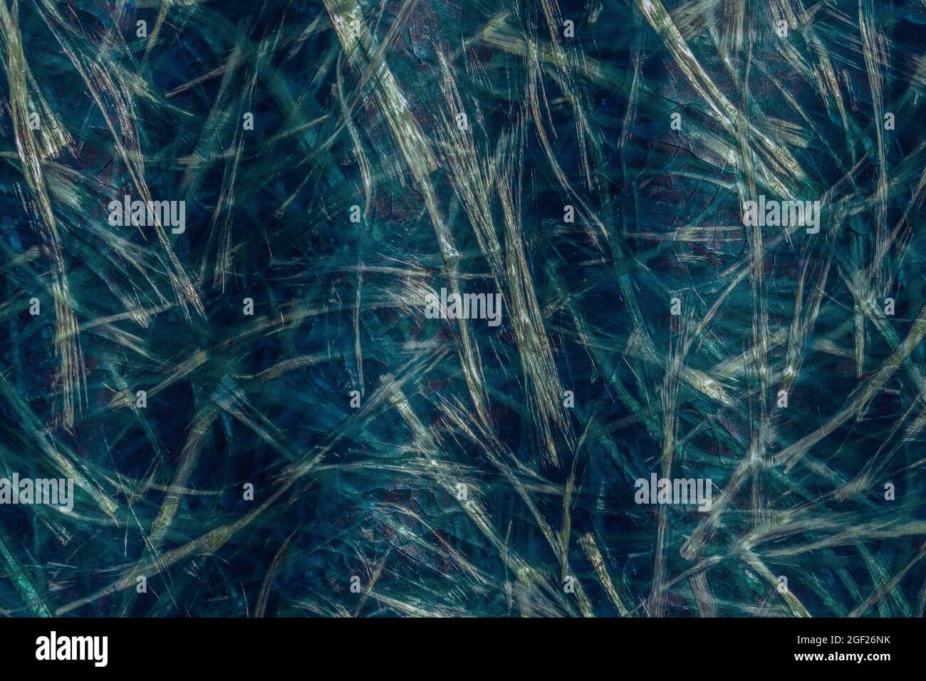 Abstrakter blau-grüner Glasfaserhintergrund. Fiberglas-Textur aus nächster Nähe. Stockfoto