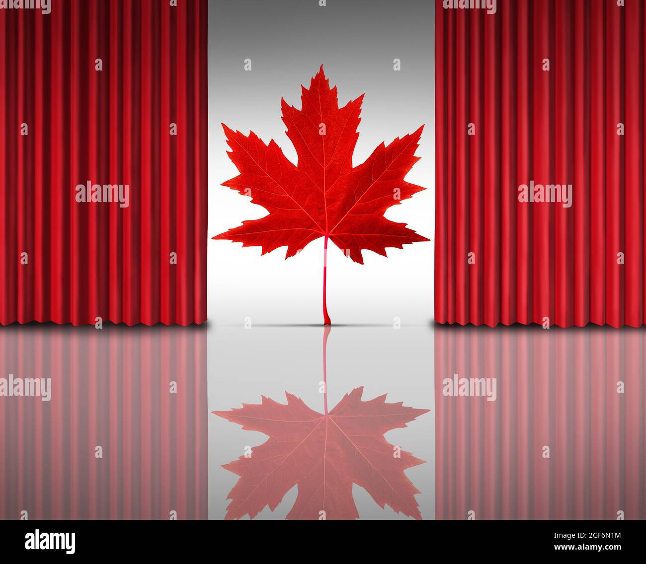Kanadischer Unterhaltungshintergrund für kanadische Kinokunst mit offenen roten Samtvorhängen oder Vorhängen, die ein rotes Ahornblatt offenbaren. Stockfoto