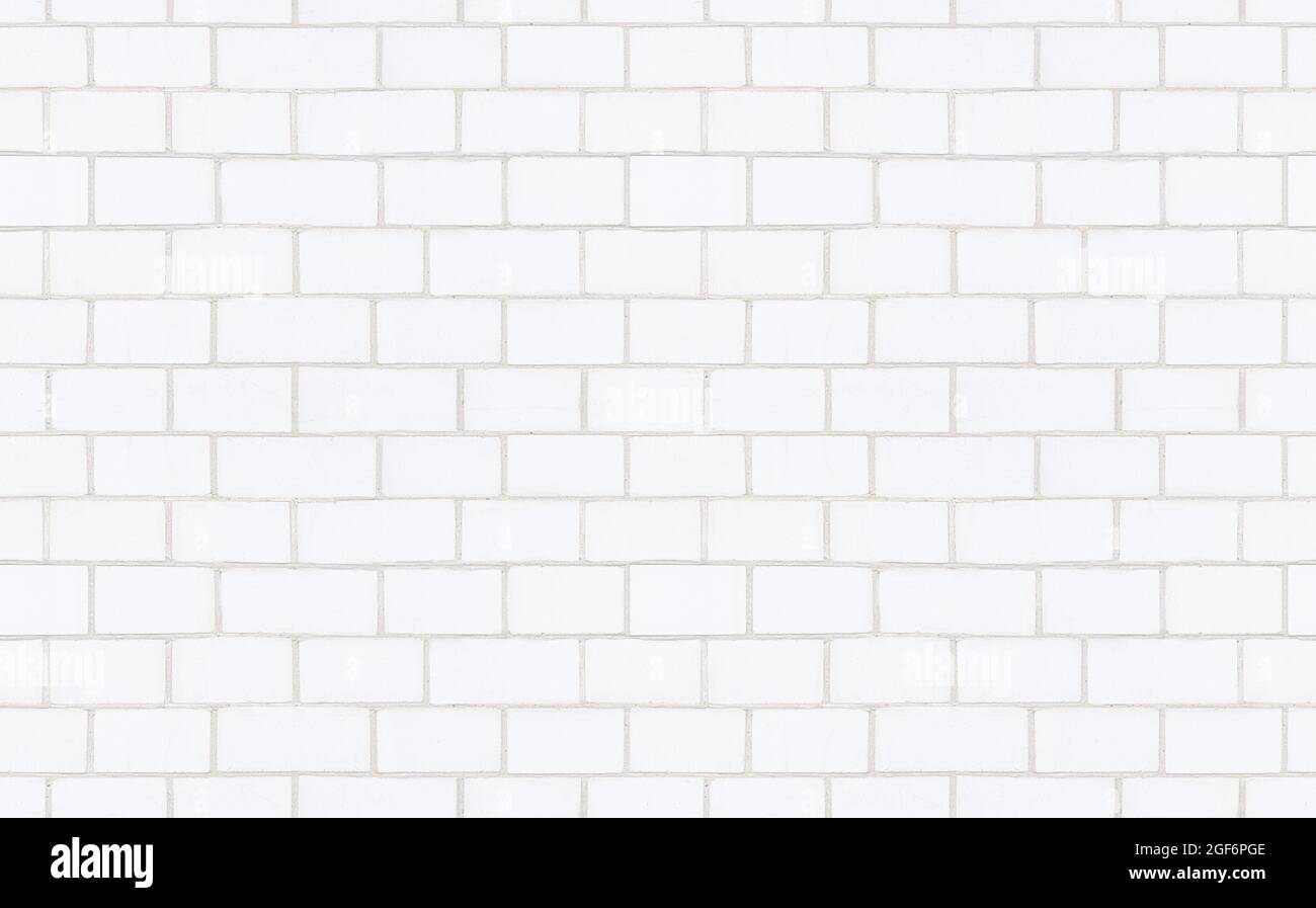 Abstraktes Vintage-Muster mit weißer Ziegelwand nahtlos auf weißem Hintergrund. Weißer Backstein Wand Textur Hintergrund. Stockfoto