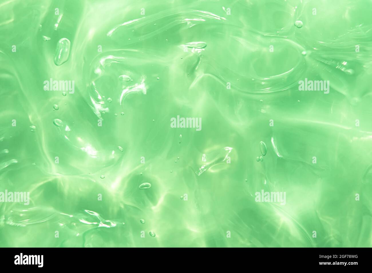 Grünes Wasser Aloe Vera Gel verschmiert Textur Stockfoto