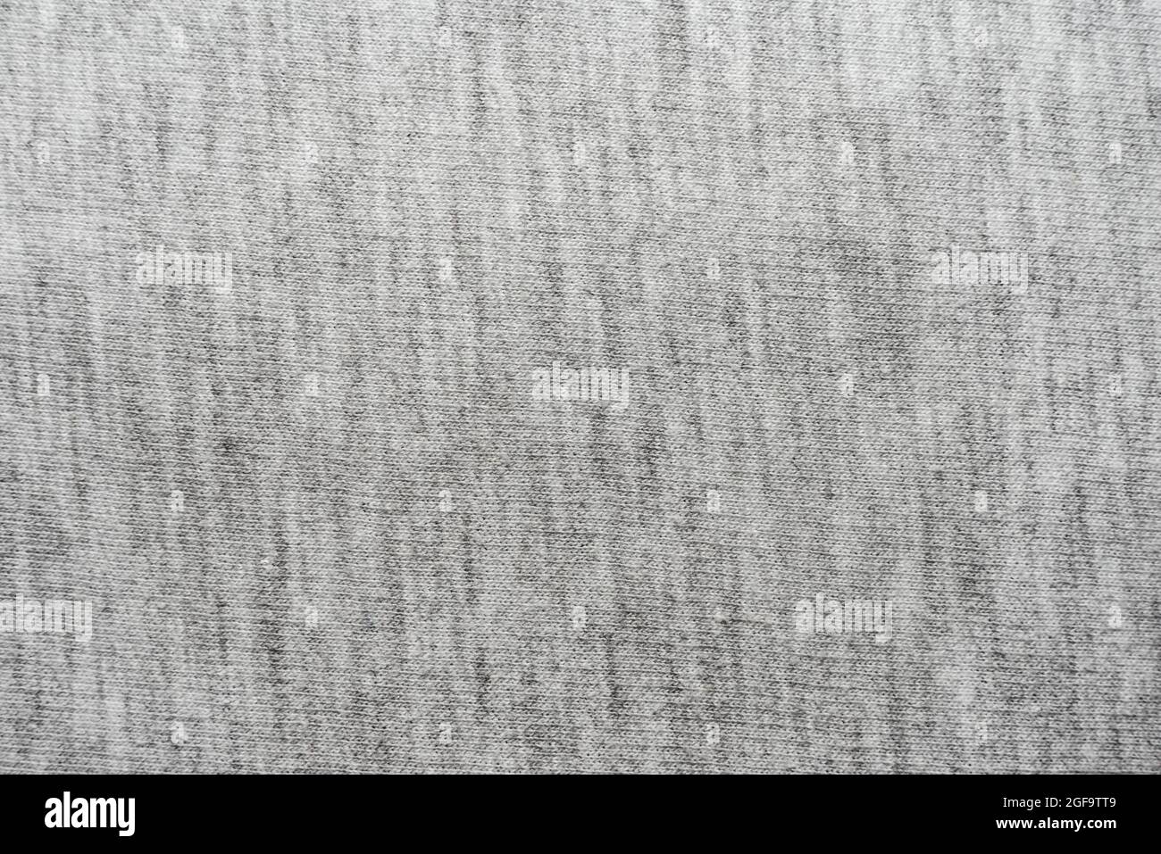 Textil. Struktur aus grauem Stoff mit geraden Linien in Nahaufnahme. Nähmaterial Stockfoto