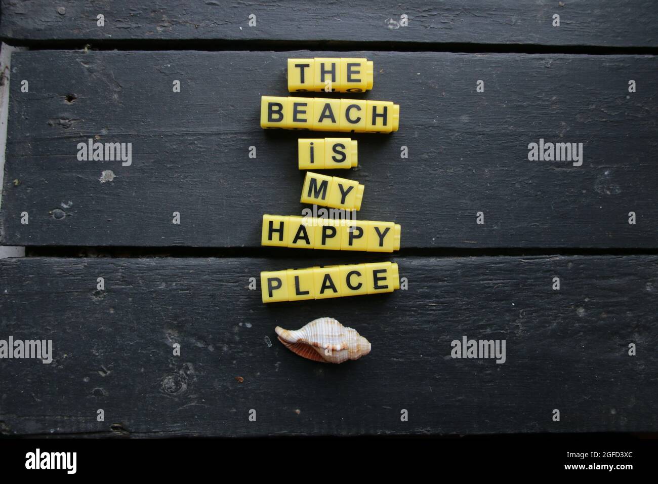 Der Strand ist mein glücklicher Ort Stockfoto