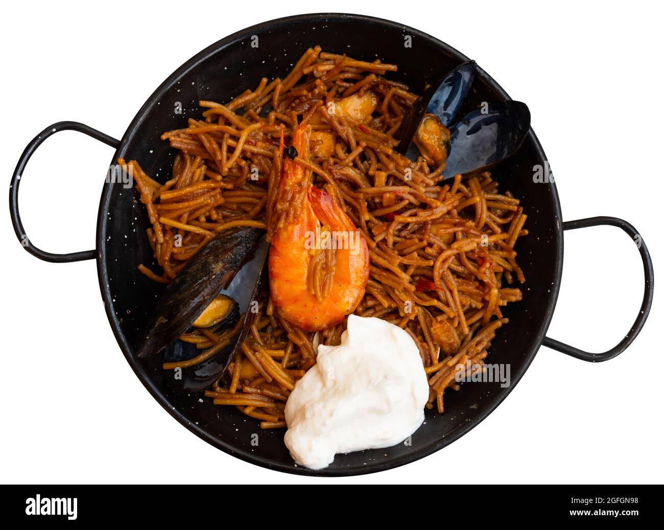 Paella mit Fideua, Nudelgerichten und Meeresfrüchten Stockfoto