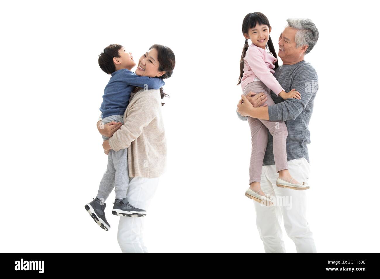 Glückliche Großeltern und Enkelkinder Stockfoto