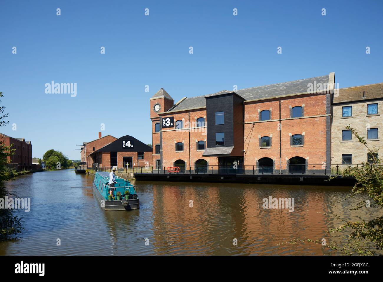 Wigan, Lancashire, Wigan Pier 2 3 und 4 mit dem Leeds Liverpool Canal Stockfoto