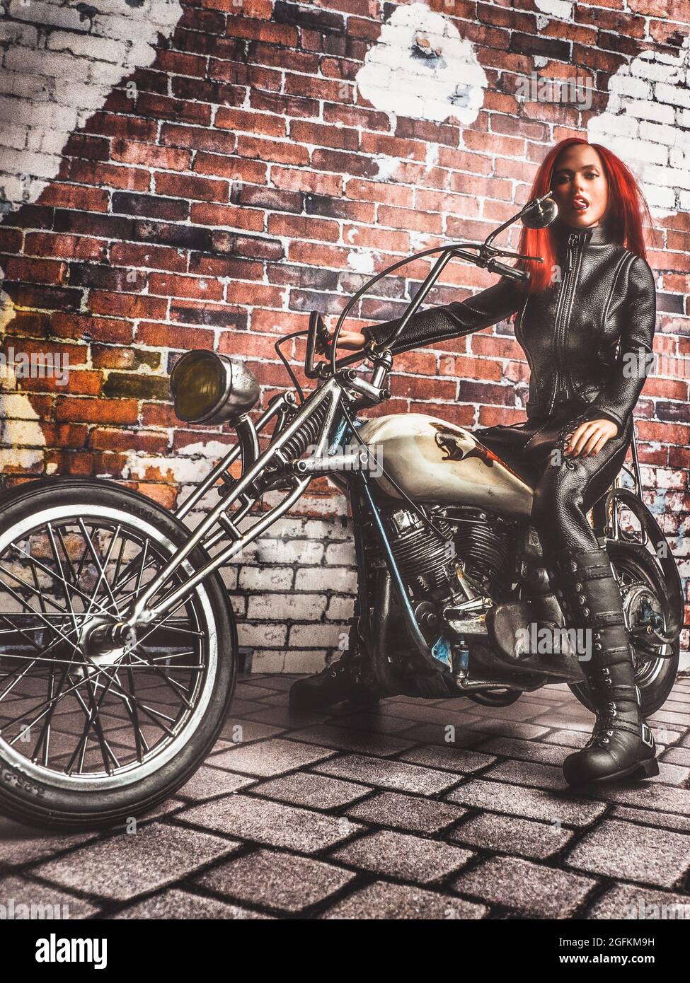 Mädchen auf einem Harley-Davidson Chopper Fahrrad, Details Stockfoto