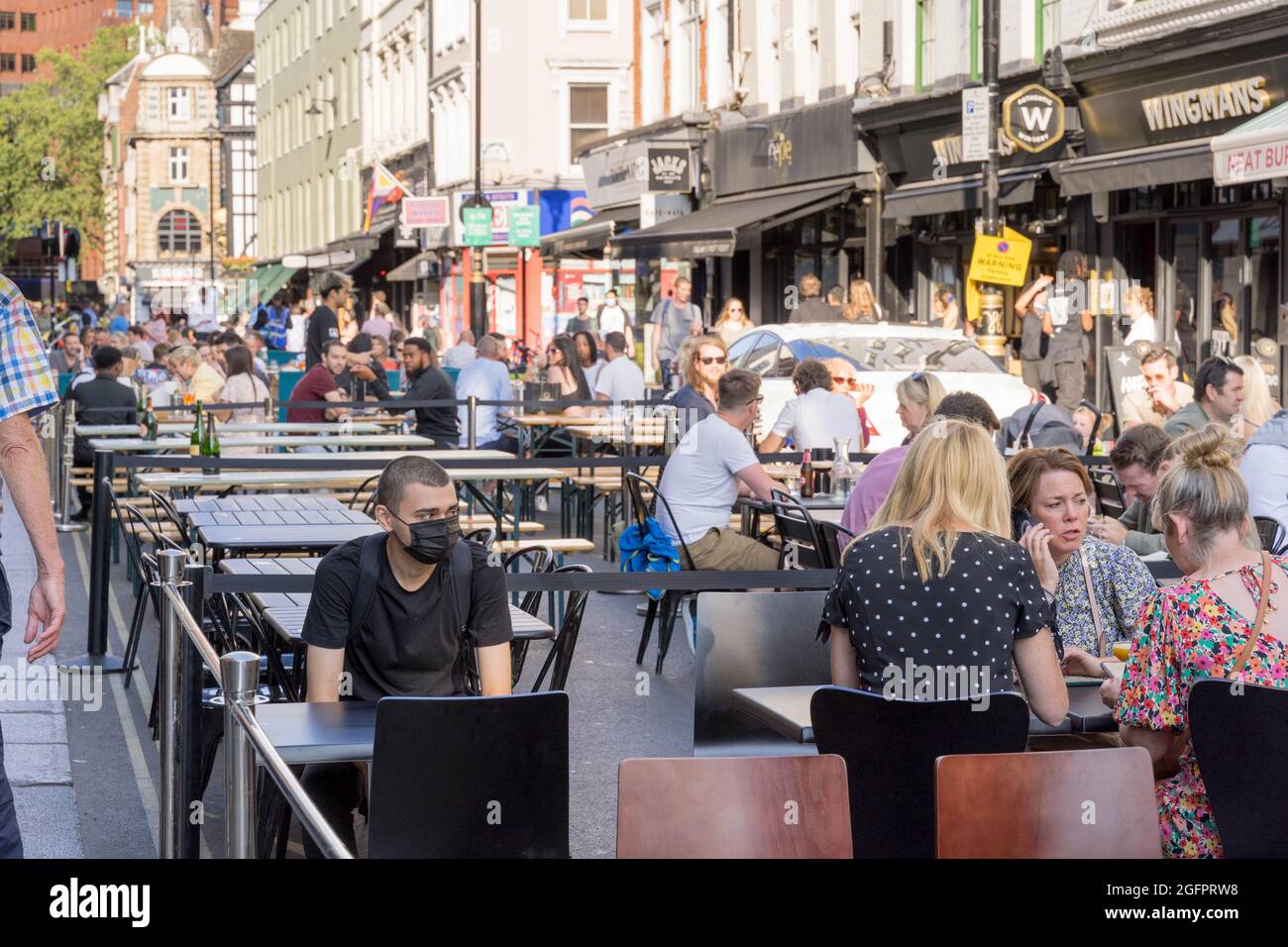 Essen im Freien auf der SOHO Street, London West End Stockfoto