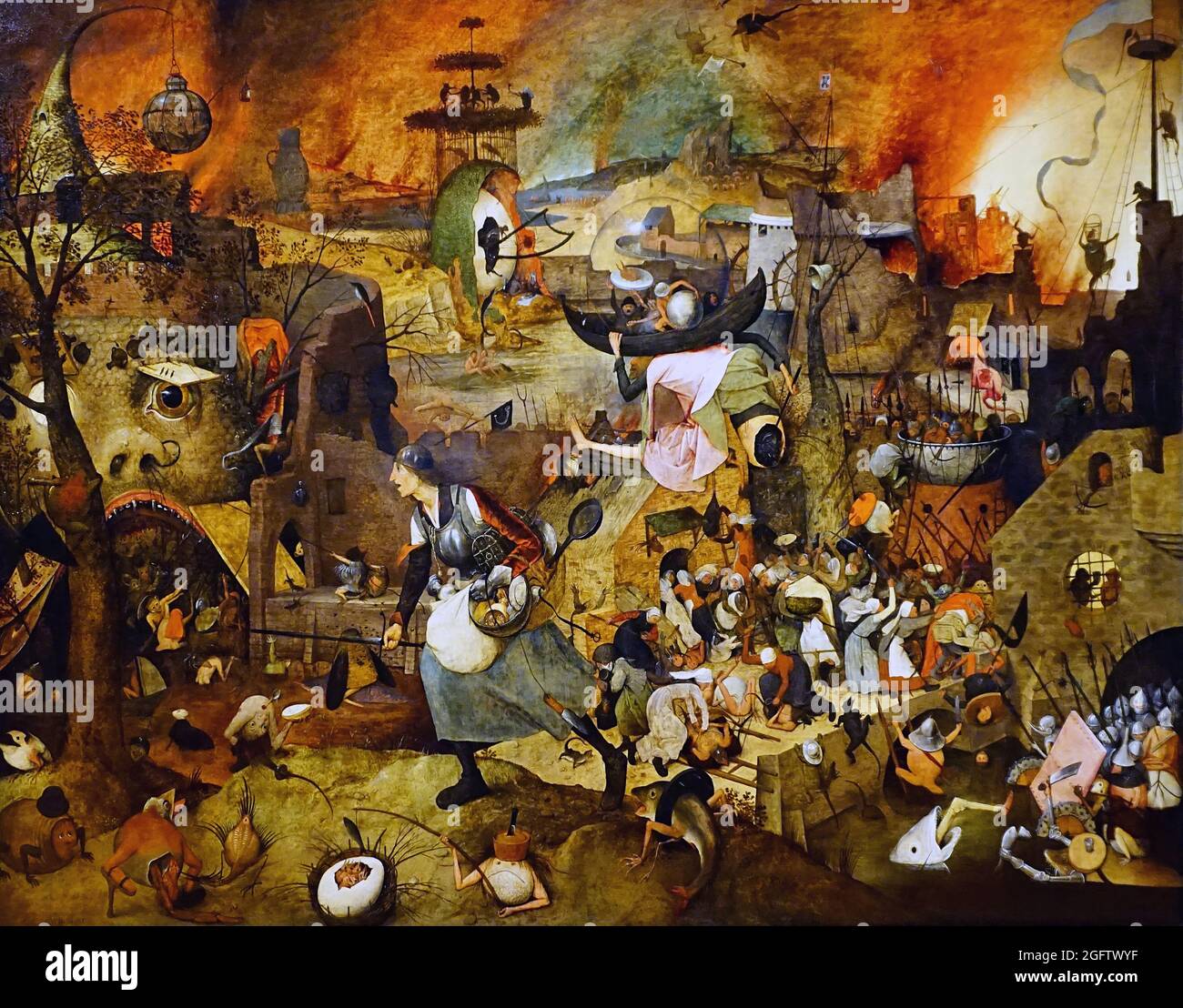 Mad Meg. Langweiliges Gret. Dulle Griet. (1563) von dem flämischen Renaissance-Künstler und Meister des Malers Pieter Bruegel dem Älteren. Eine Figur der flämischen Folklore. Das Gemälde zeigt einen Virago, Dulle Griet, der eine Armee von Frauen führt, um die Hölle zu plündern. Ein Horrorfilm in gemalter Form. Stockfoto