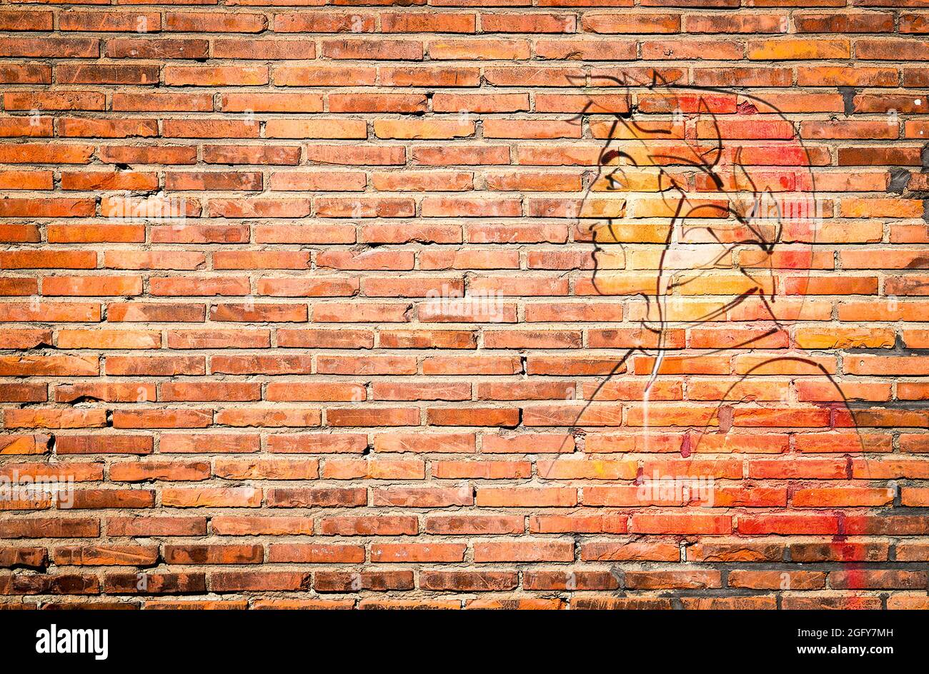 Dante Alighieri Graffiti-Profil auf orangenen Backsteinwänden Stockfoto