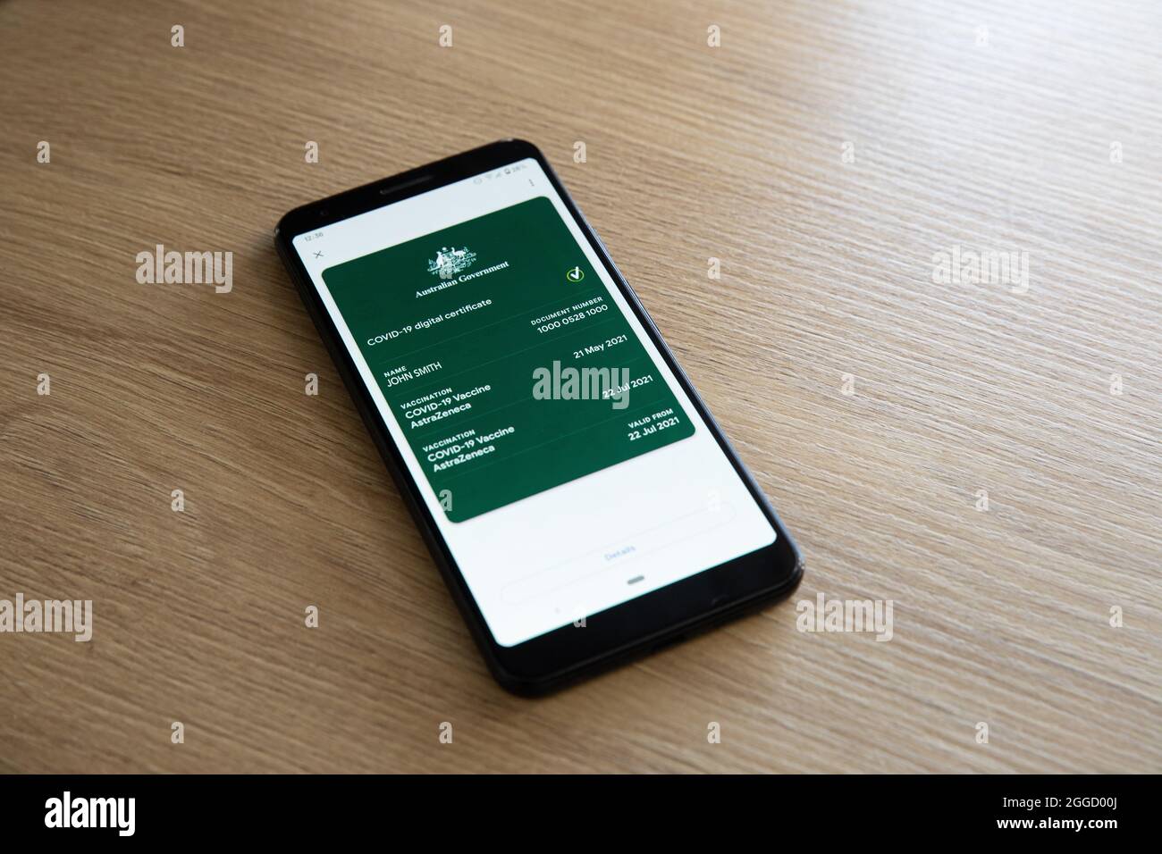 Der australische digitale Covid-19-Impfpass, der auf einem Telefon angezeigt wird. (Name und Nummer wurden auf diesem Bild geändert) Stockfoto