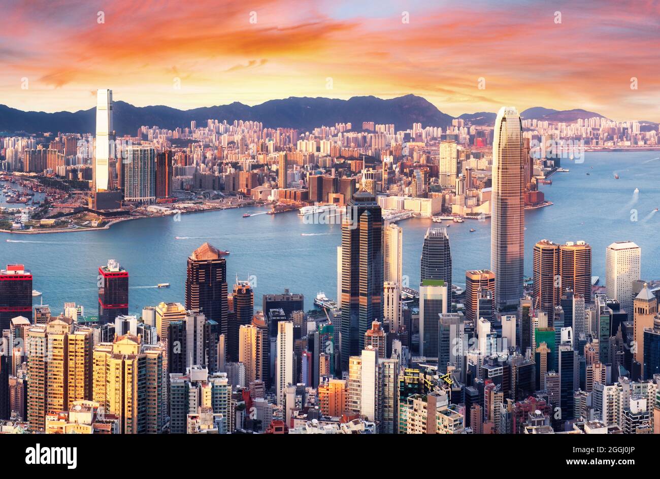Hongkong - Sonnenuntergang über dem Hafen von Victoria, China Stockfoto