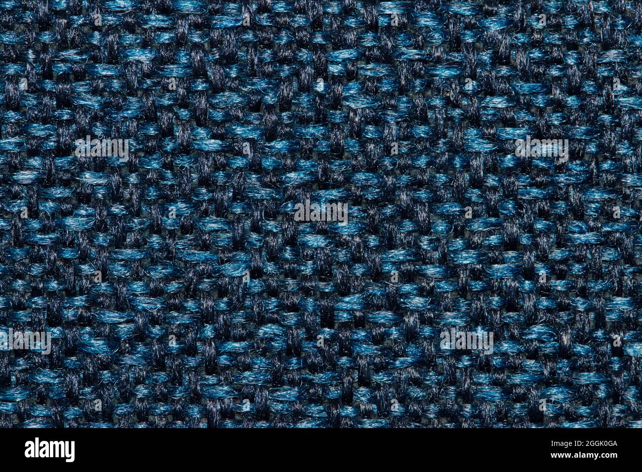 Marineblaues Stofffarbmuster mit hellen Flecken. Stockfoto