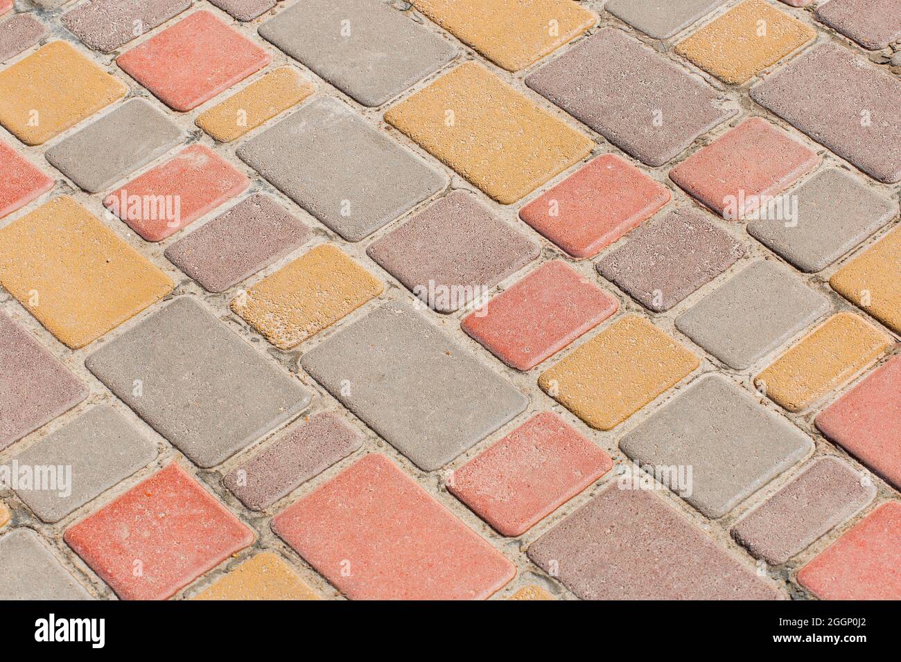 Bürgersteig farbigen Mosaik Boden Fliesen Stadt Straße Straßen Textur Hintergrund. Stockfoto