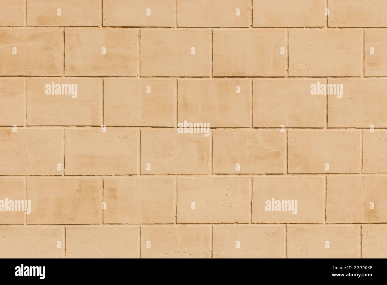 Helle Farbe Sand Backstein Block Stein Muster Oberfläche Innenwand Textur Hintergrund. Stockfoto