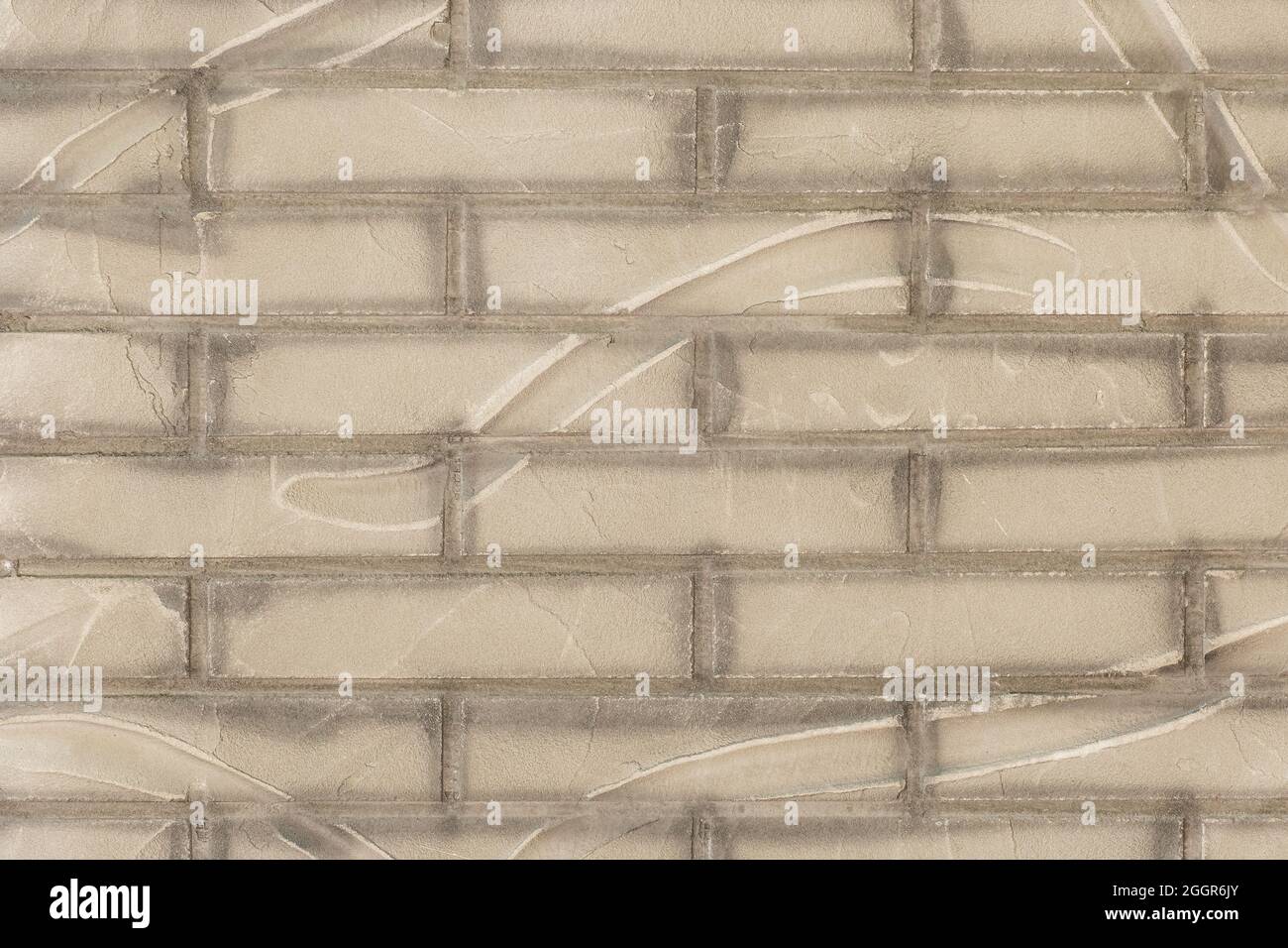 Schmutzige Farbe grau Ziegelwand mit abstraktem Design Muster Textur Dekor Hintergrund. Stockfoto
