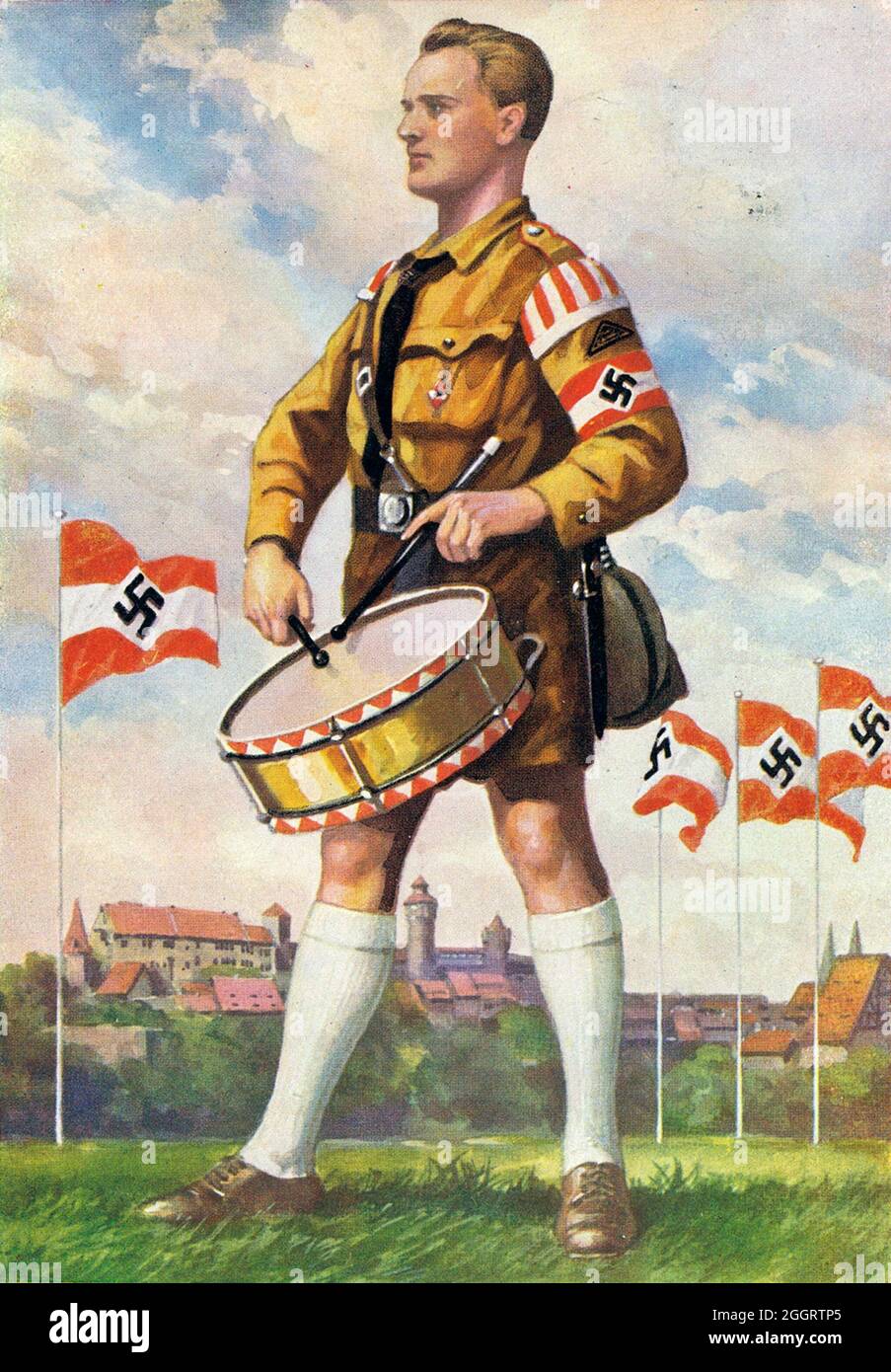 Ein Vintage-Plakat zur jährlichen Nazi-Nürnberger Kundgebung, auf dem ein uniformierte Mitglied der Hitler-Jugend (HJ) eine Militärtrommel spielt Stockfoto