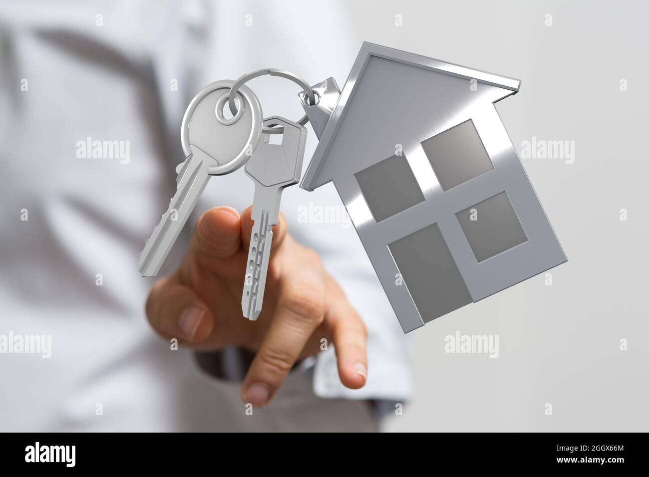 Person, die ein digitales kleines Haus mit Dach in 3D rendert Stockfoto