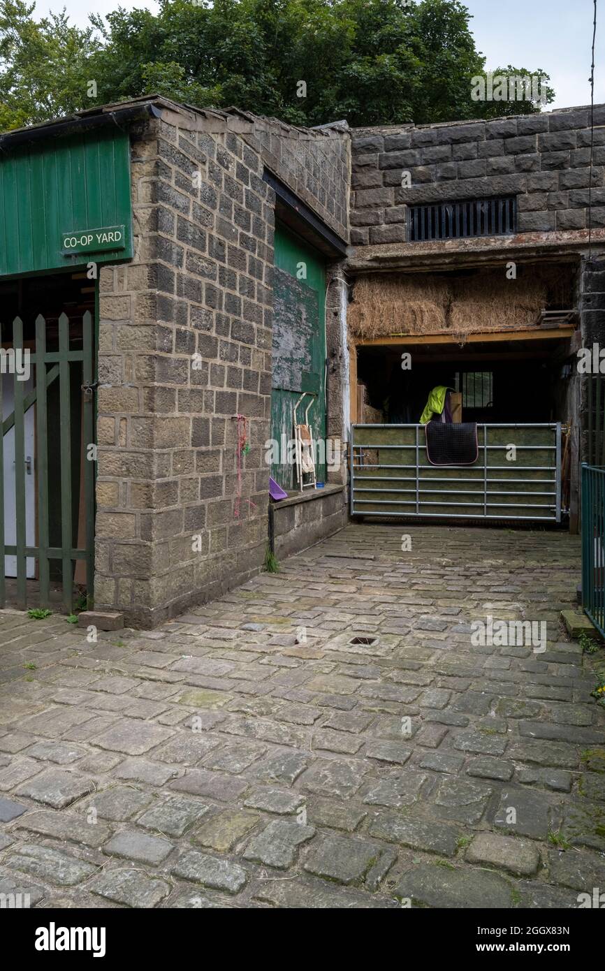 Überreste der 1860 in Heptonstall zusammengeschlossenen Genossenschaft, die später mit Hebden Bridge, einer historischen viktorianischen Konsumgesellschaft, verschmolzen wurde Stockfoto