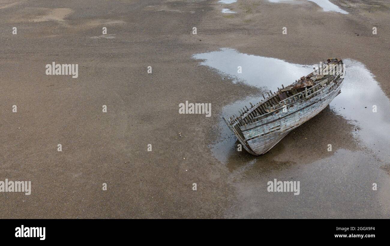 Verlassene Boot in Duras Bay Stockfoto