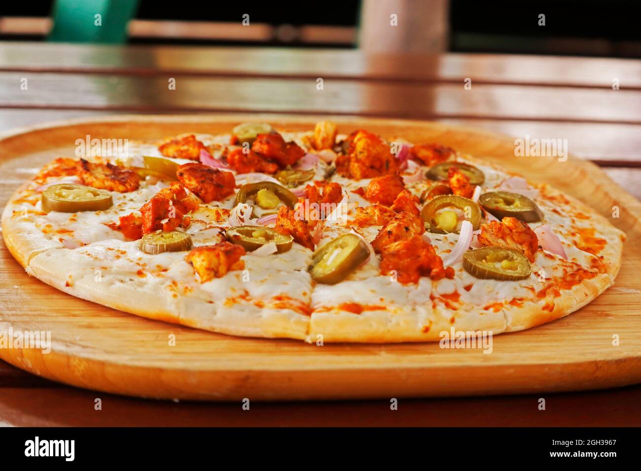 Tikka pizza -Fotos und -Bildmaterial in hoher Auflösung – Alamy