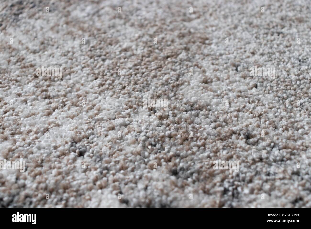 Beige und grau Stoff Textur Teppich Hintergrund . Teppich Hintergrund Nahaufnahme. Stockfoto