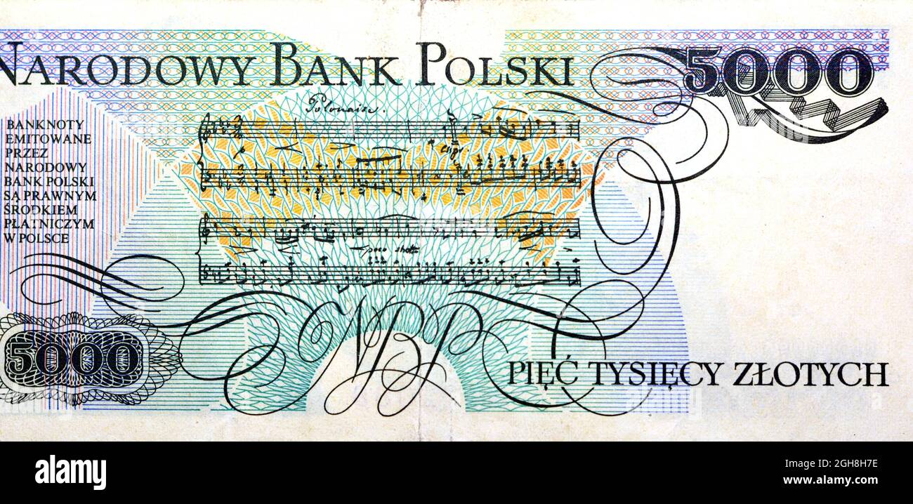 Großes Fragment der Rückseite von 5000 5000 alten polnischen Zlotych-Banknoten, Jahr 1986 mit polonaisischen Noten, polnischem Zloty-Geld, Stockfoto