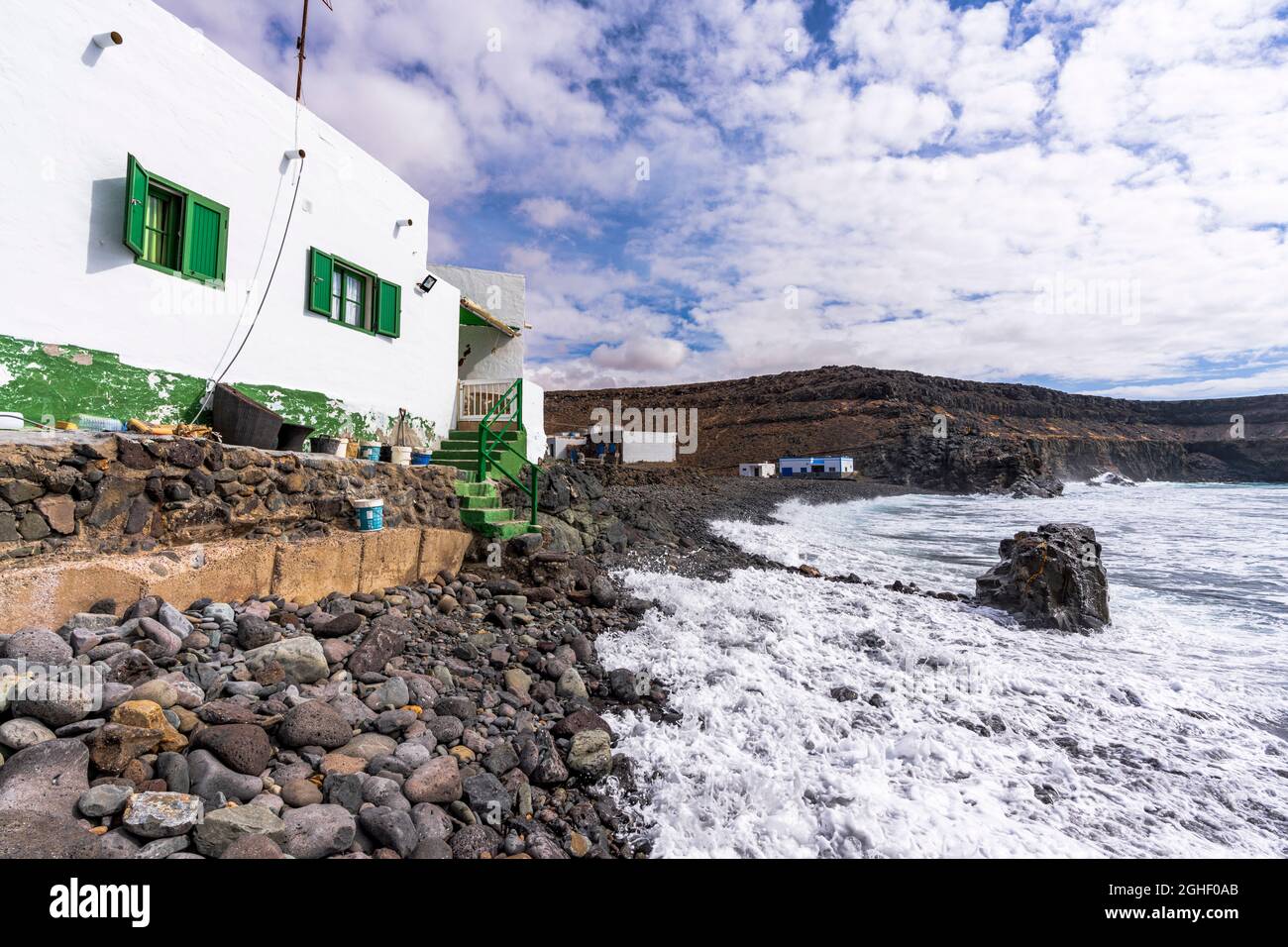 Fischerhaus mit Blick auf den Ozean, El Puertito de Los Molinos, Tefia, Fuerteventura, Kanarische Inseln, Spanien Stockfoto