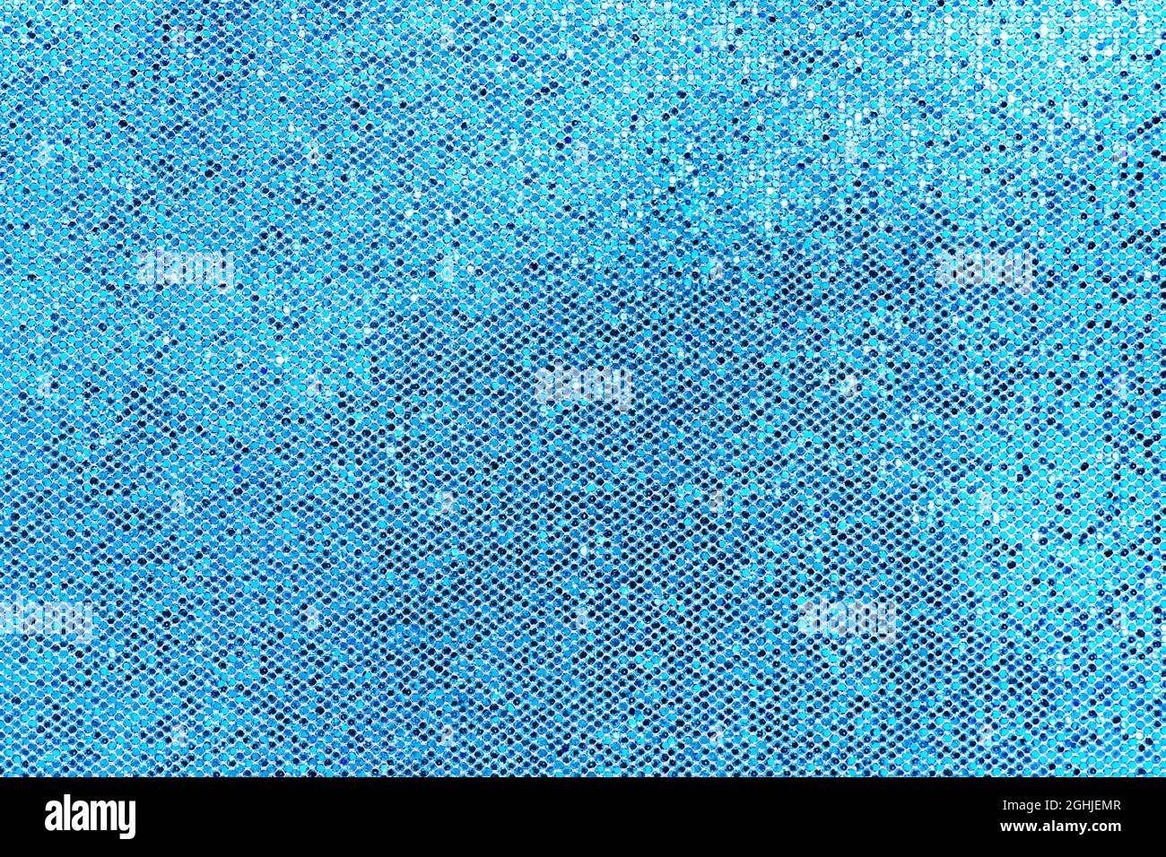 Glänzende Qualität Indigo. Blaue Glitter-Stoffstruktur. Stockfoto