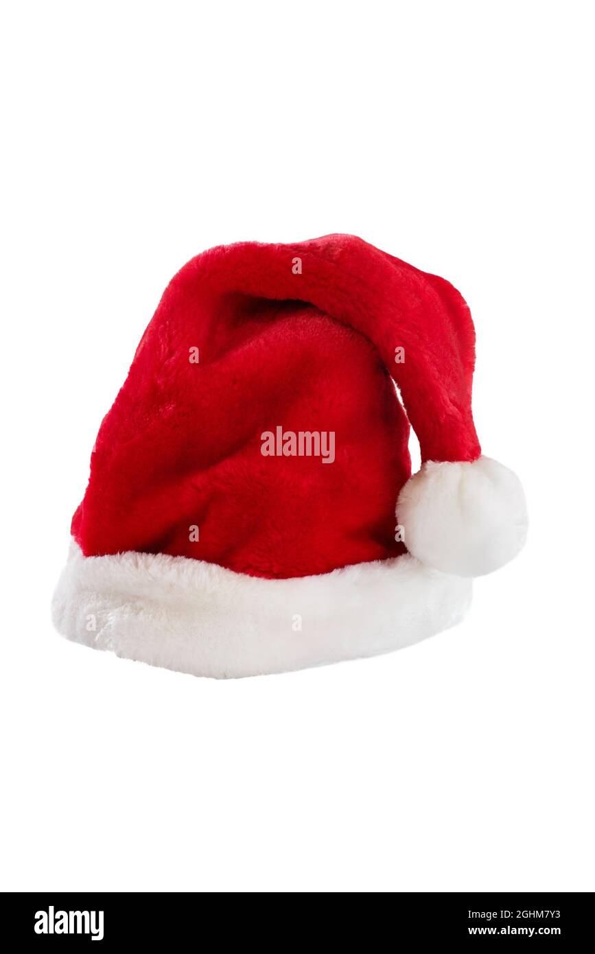 Ein roter Weihnachtsmannmütze aus Fell, isoliert auf weißem Hintergrund. Stockfoto