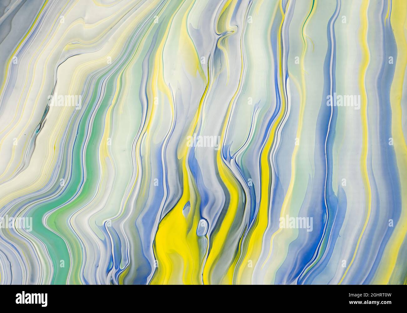 Abstraktes Bild von verschiedenen Farben der Acrylfarbe gemischt Mit einer Technik zum Ausgießen von Farben Stockfoto