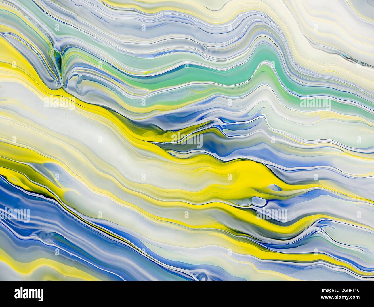 Abstraktes Bild von verschiedenen Farben der Acrylfarbe gemischt Mit einer Technik zum Ausgießen von Farben Stockfoto