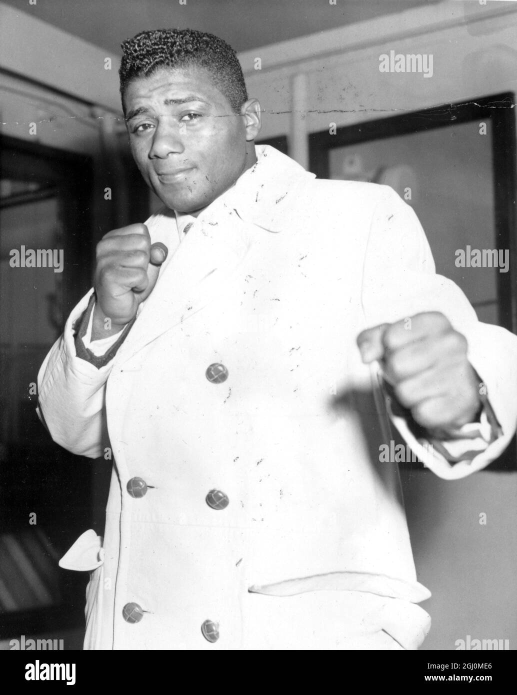 Floyd Patterson World Heavyweight Champion in Tilbury, nachdem er auf dem Cunard-Liner '' Saxonia'' ankam, um ein Ausstellungsspiel in der Empress Hall zu kämpfen. 21. März 1958 Stockfoto